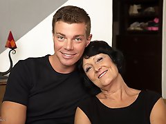 Horny mature lady seducing the young guy next door